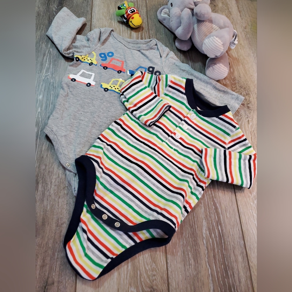 Baby Gap 2 long sleeve onesies. 1 striped Henley and 1 gray graphics 6-12 mos.